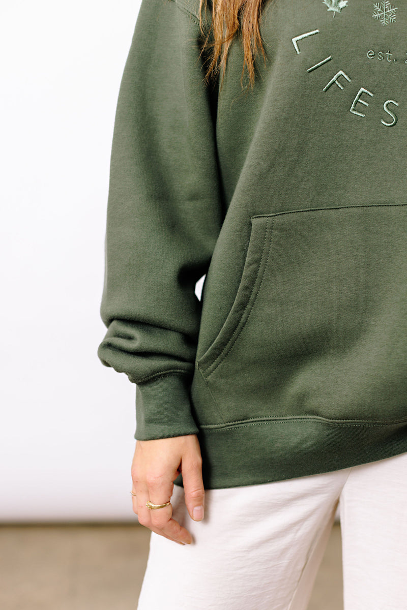 The classic Okanagan Lifestyle logo you love, on a hoodie. This oversize cut green on green hoody comes with an embroidered logo.